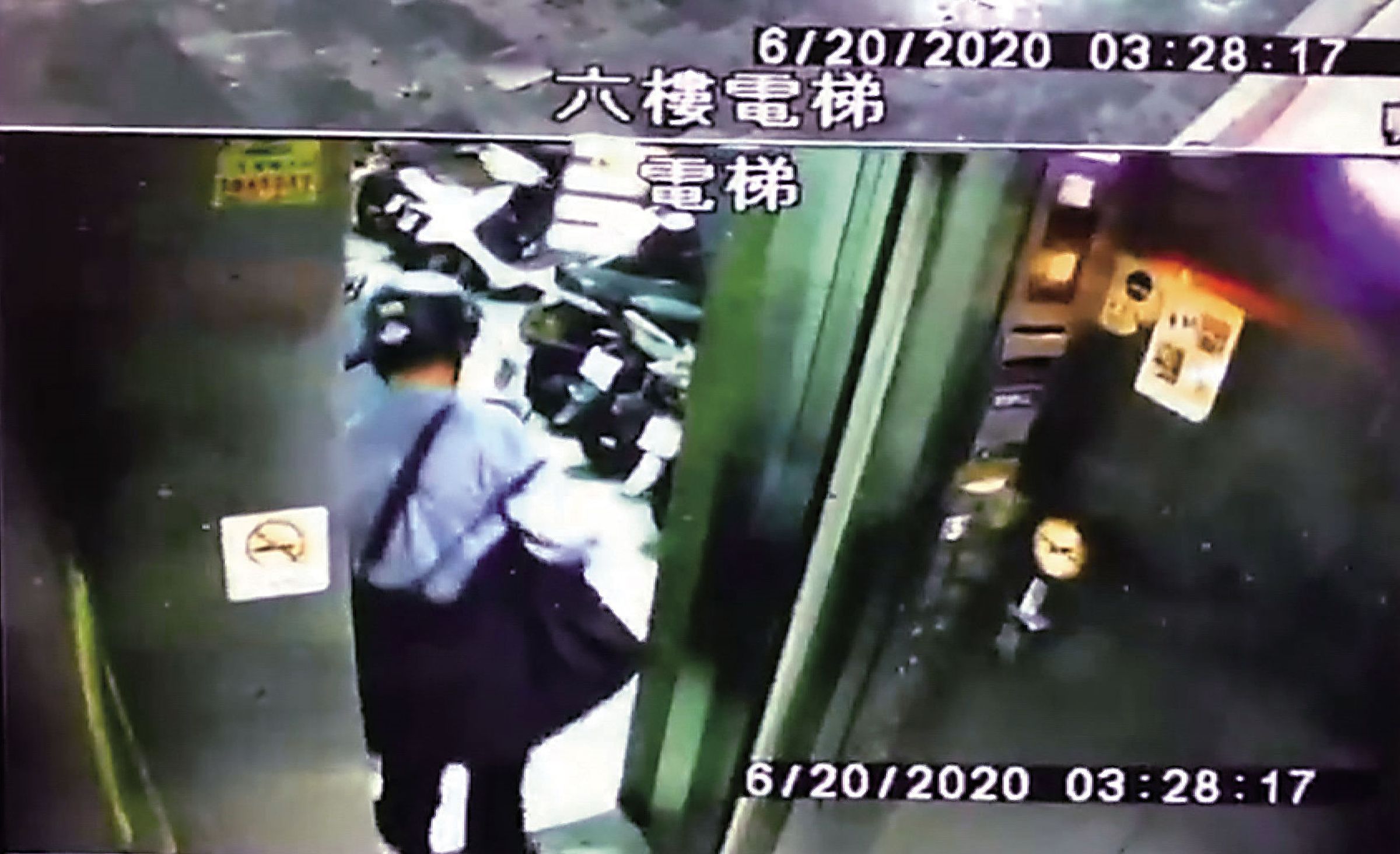 羅姓男子揹著黑色旅行袋進出死者住處,被監視器清楚拍下。(翻攝畫面)