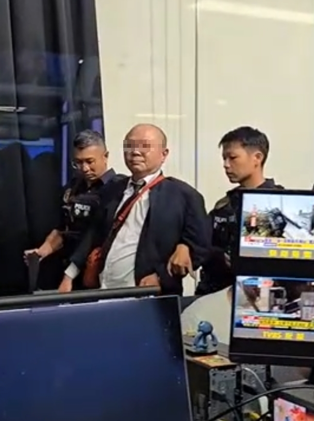 呂姓男子聲稱要討百萬美元的「版權費」,竟闖進電視台。(翻攝畫面)