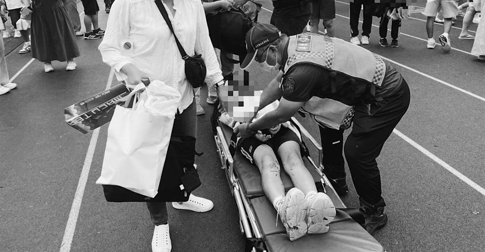 一名17歲女同學在攤位使用卡式爐，疑似不慎引燃上衣燙傷，造成腹部18％一度燒傷。（翻攝畫面）