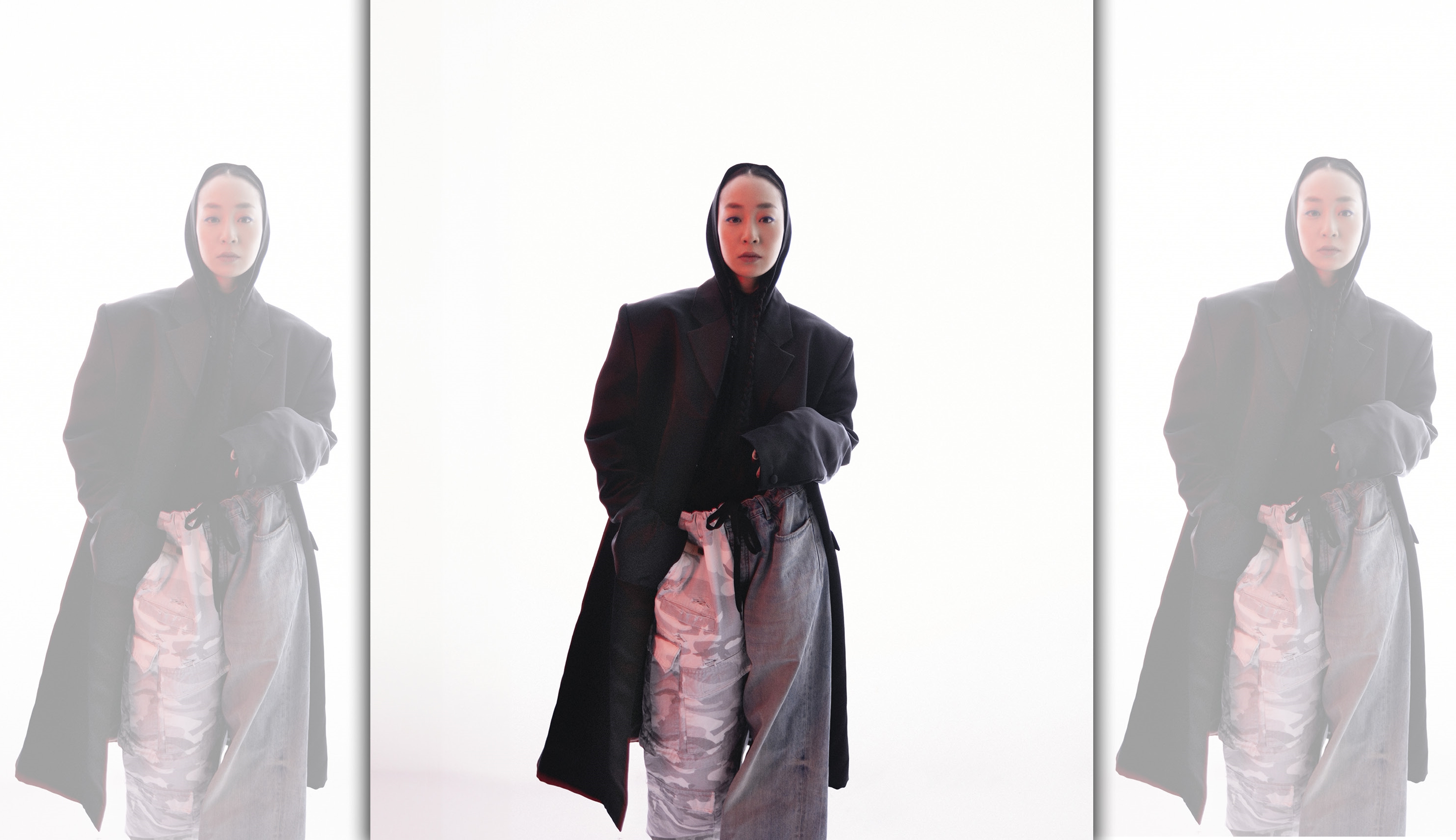 公爵夫人黑色絲緞繭形大衣 NT$215,000 by Givenchy；黑色連帽棉質T NT$25,000 by Balenciaga；拼接丹寧褲 NT$86,400 by Balenciaga；黑色尖頭鞋 NT$36,500 by Givenchy。