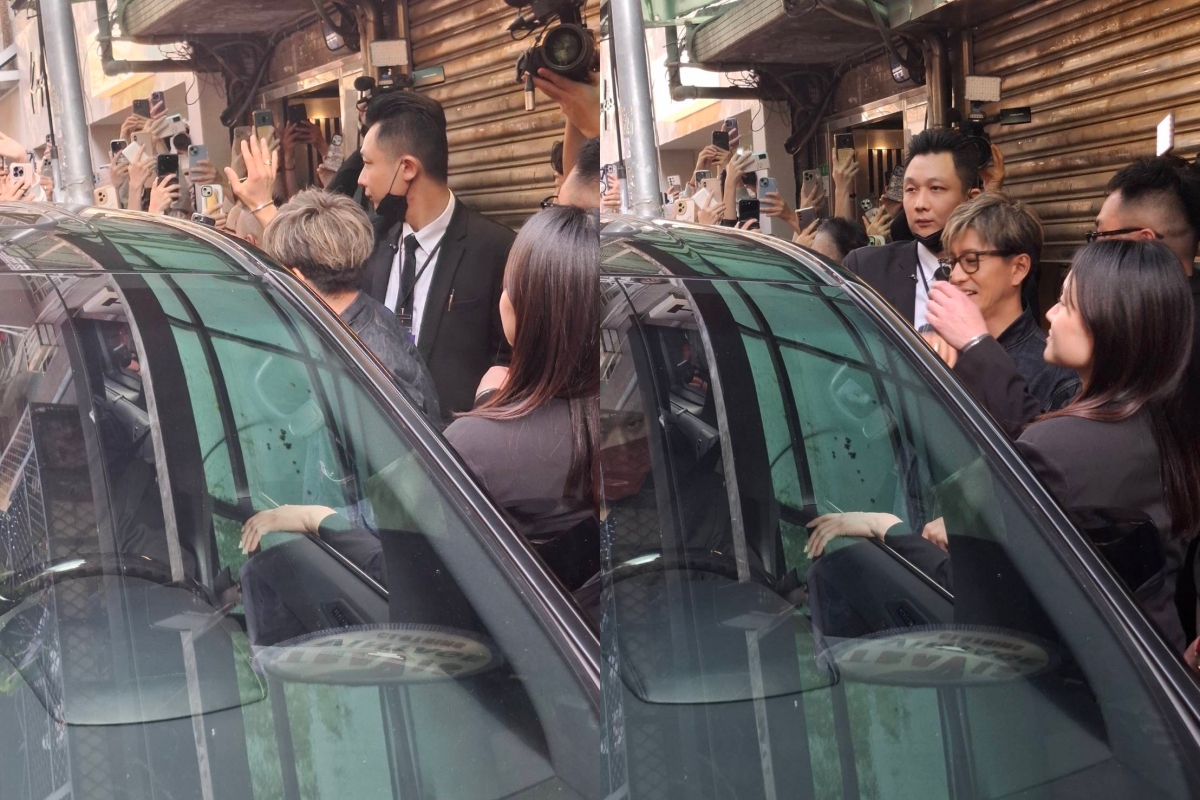 木村拓哉昨天離開赤峰街古著店時,已經上車還特地探頭出來揮手。(讀者提供)