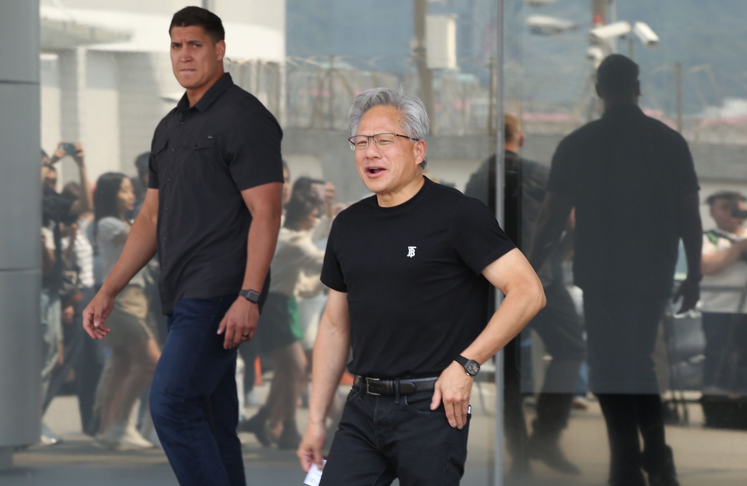 輝達執行長黃仁勳今將出席世壯運傳遞聖火。（鏡報新聞網提供）