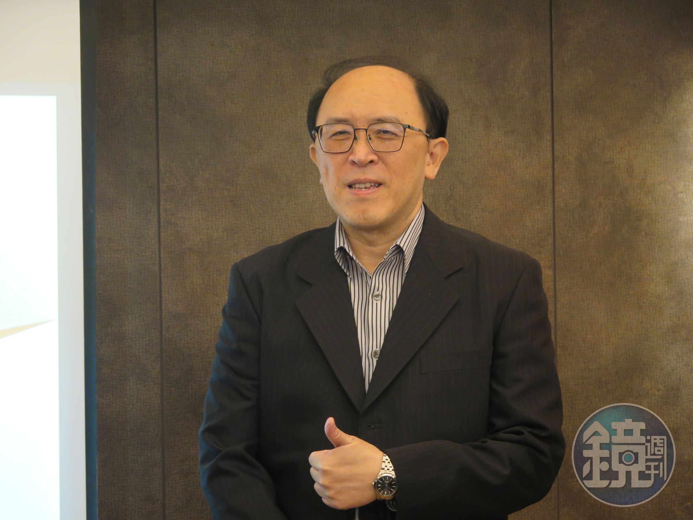 統振總經理何明哲。