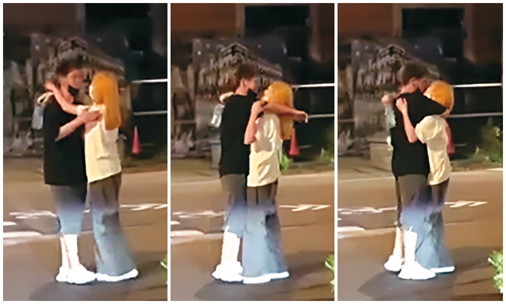 皇毅和陳天仁熱戀時，止不住愛意在大街上擁抱親吻。（友人提供）