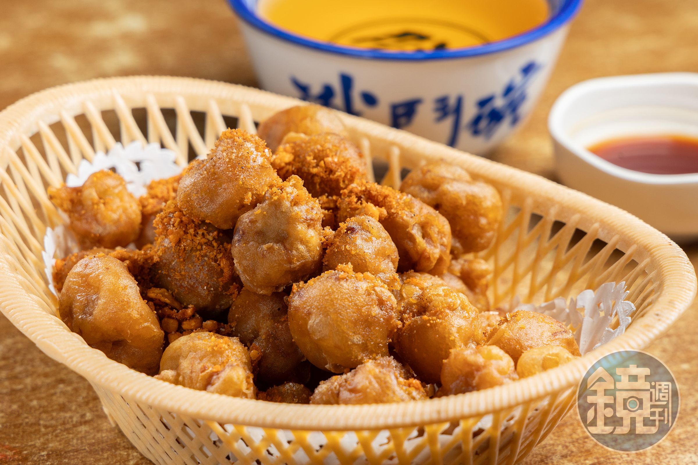彈牙脆口的「椒鹽八爪魚咀」是店內牆上力薦的必點小食。(港幣85元/份,約NT$328)