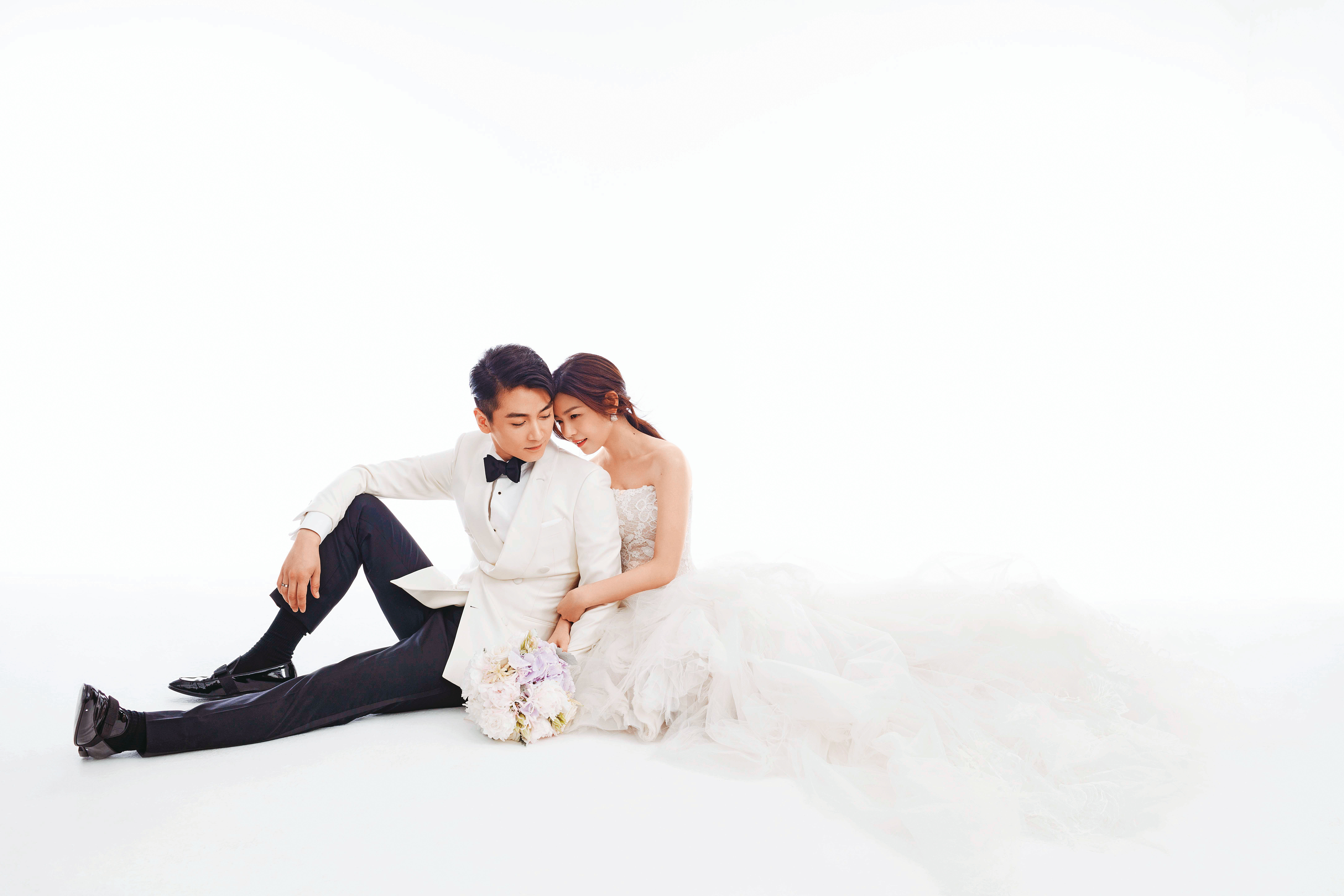 陳妍希（右）與陳曉（左）結婚8年，近來屢傳婚變。蔡上機建議聯袂公開秀恩愛，將可扭轉流年運勢。（卡地亞提供）