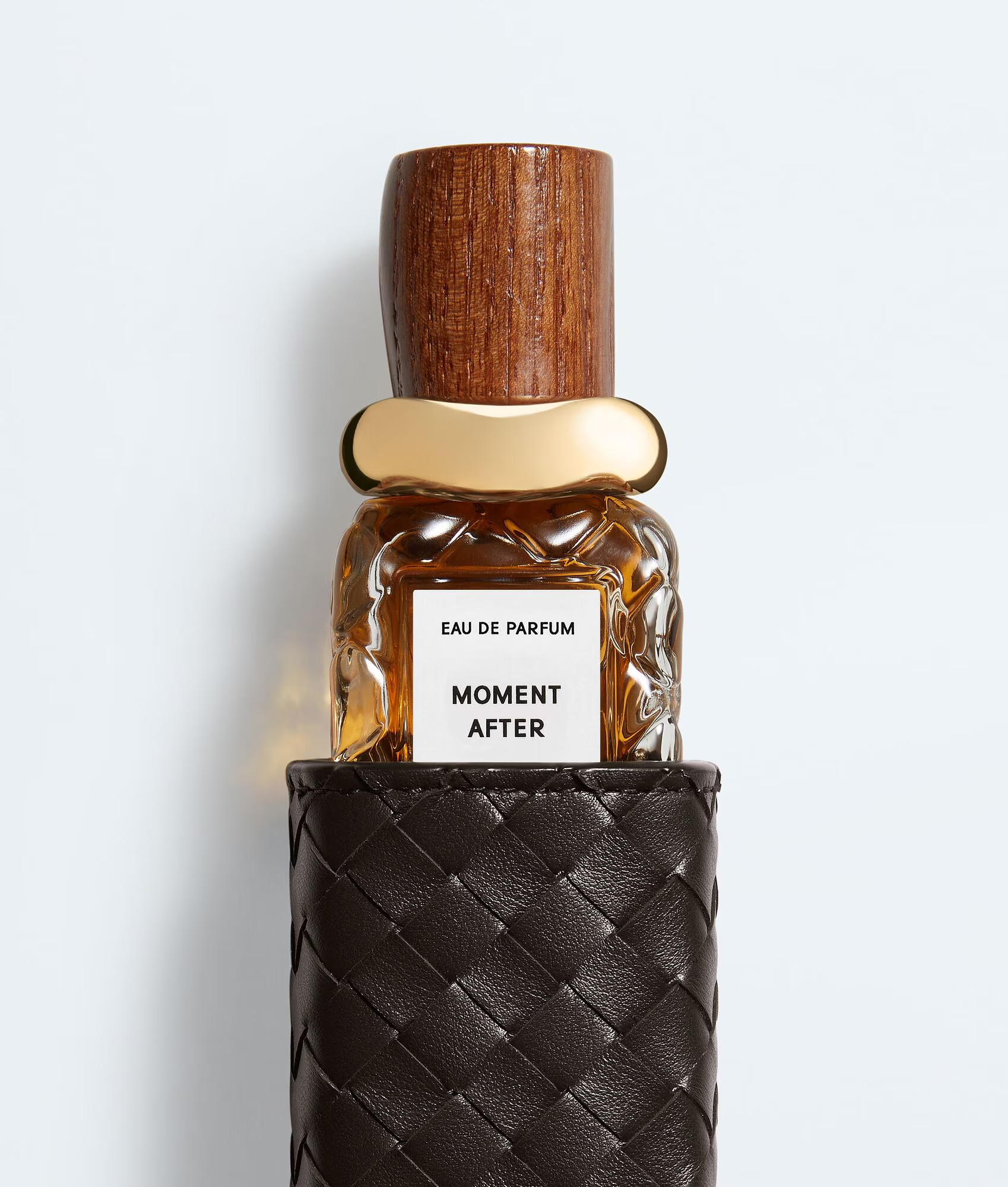 編織皮革香水保護套(適用於50ml)。NT$15,800（BOTTEGA VENETA提供）       