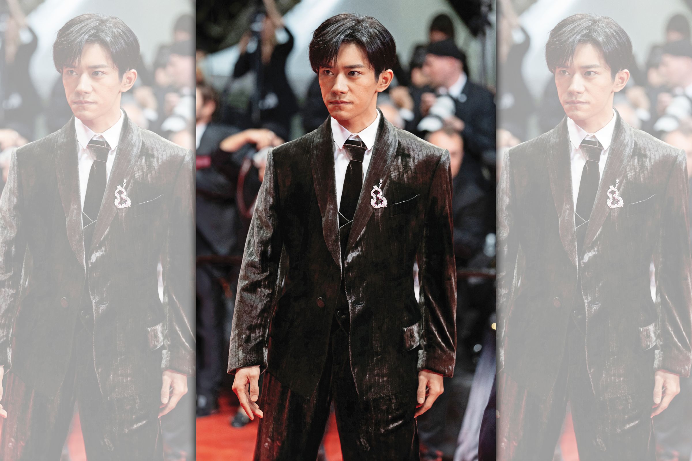 易烊千璽以一身灰色絲絨Emporio Armani西服，搭配Qeelin珠寶帥氣現身紅毯，年僅24歲的他性格沉穩，在電影裡一人分飾五角的演出亦獲影評人稱讚。（東方IC）