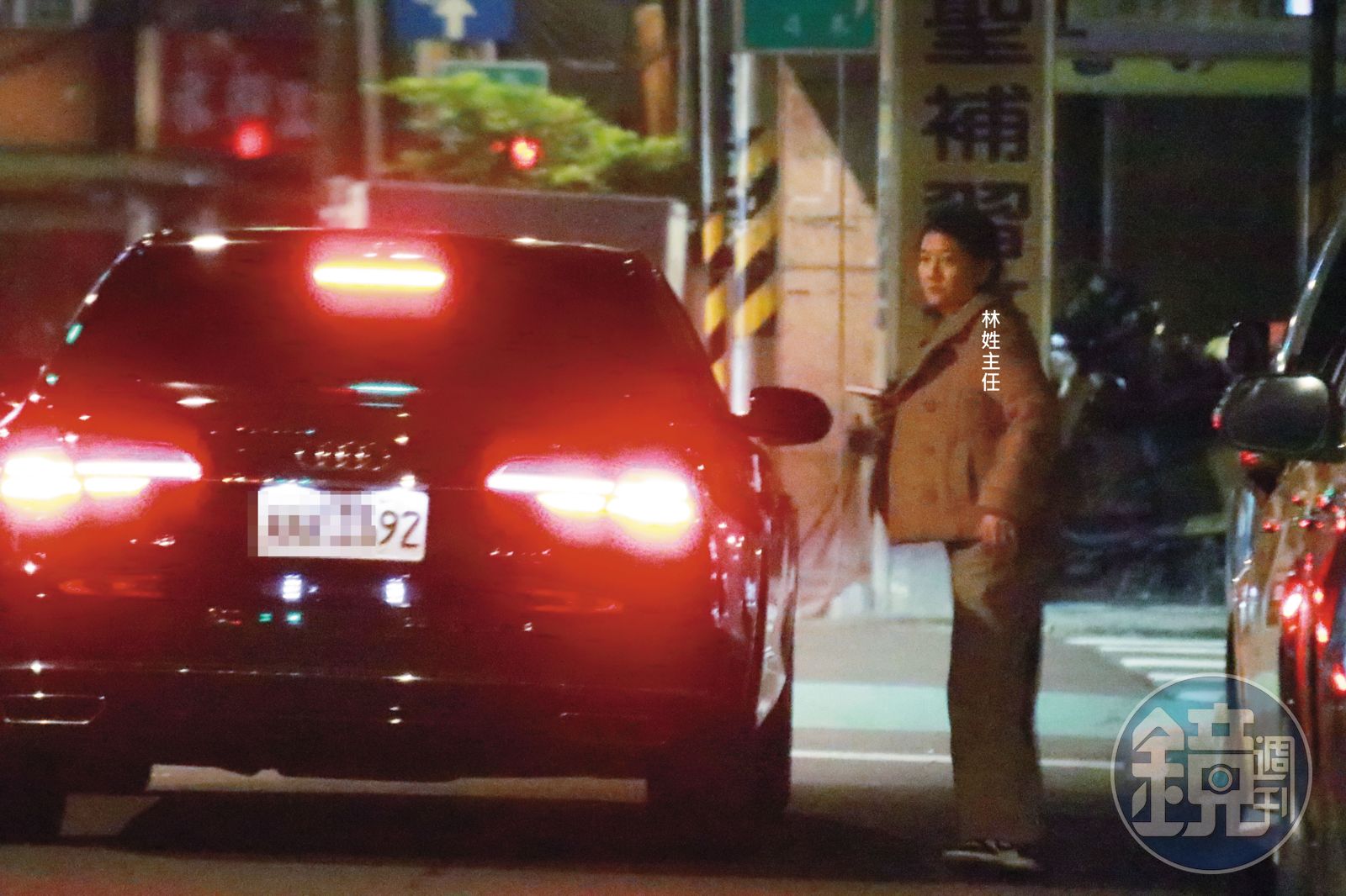 23：25 林姓主任自江啟臣座車下車