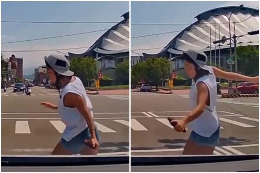 苗栗市國華路、民族路口上，一名女子疑似趕著買東西違規穿越馬路。（翻攝「WoWtchout - 地圖型行車影像分享平台」）