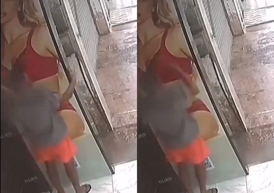 馬來西亞一名噁男竟當街猥褻廣告看板，畫面被監視器錄下。（翻攝reddit）