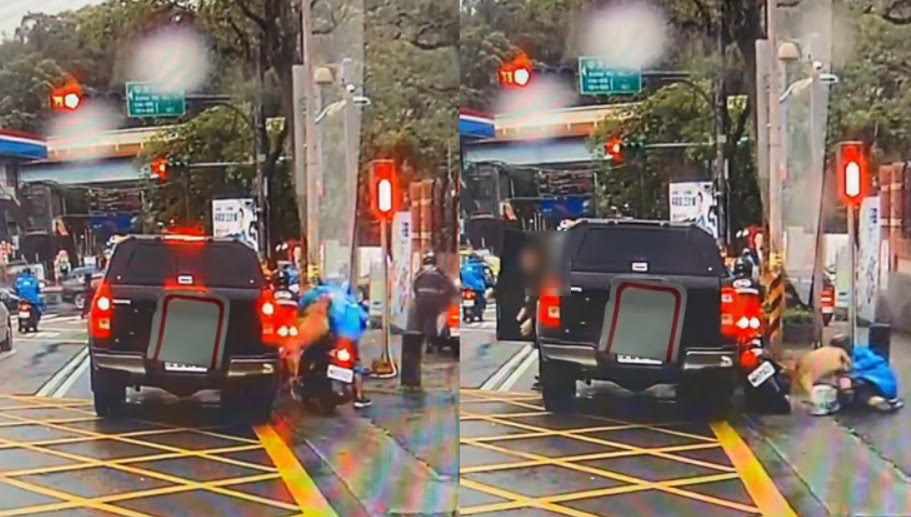 台北市一名機車騎士停等紅燈時,隔壁車窗突然跳出一隻比特犬攻擊他,將他撲倒在地撕咬。(翻攝IG@crazy.taiwan)