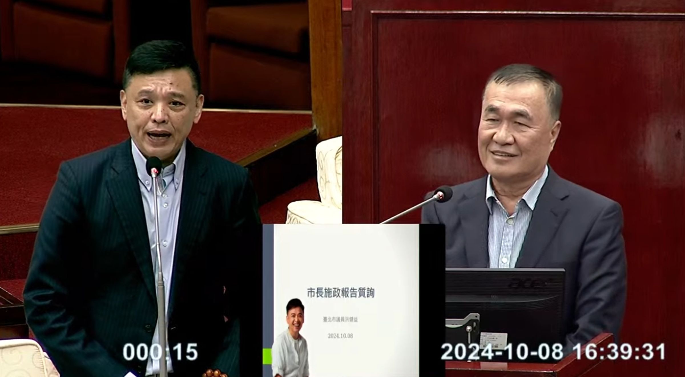 洪健益問李四川何時要去新北市選舉,李四川笑回好朋友不要叫人去選舉。(翻攝自台北市議會直播)