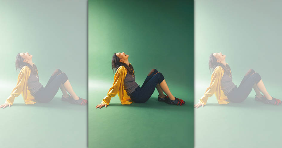 黃色緞面襯衫 價格店洽 by MAX&Co.；灰色彈性針織背心 價格店洽 by PRADA；深藍色及膝褲 價格店洽 by PRADA；緞帶蝴蝶結芭蕾訓練鞋 價格店洽 by Simone Rocha；自然流線雙圈耳環 NT$5,280 by PANDORA；吊飾造型項鍊 NT$43,600 by GUCCI；流星開圈戒指 NT$2,880 by PANDORA；自然波紋戒指 NT$2,480 by PANDORA。