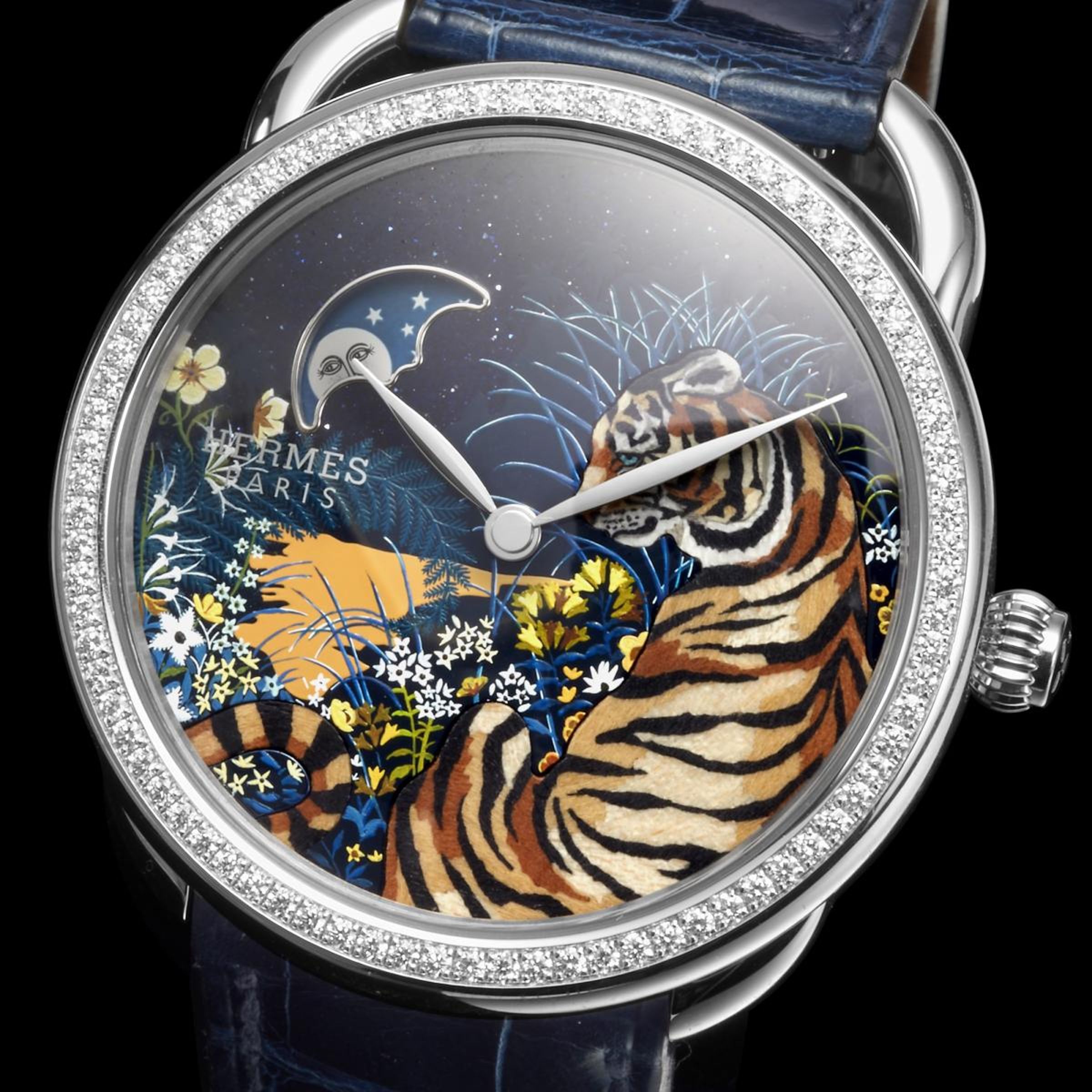 愛馬仕 Arceau Tyger Tyger 工藝腕錶,面盤以砂金石微繪與木片細工鑲嵌製作而成,定價約NT$3,765,000。