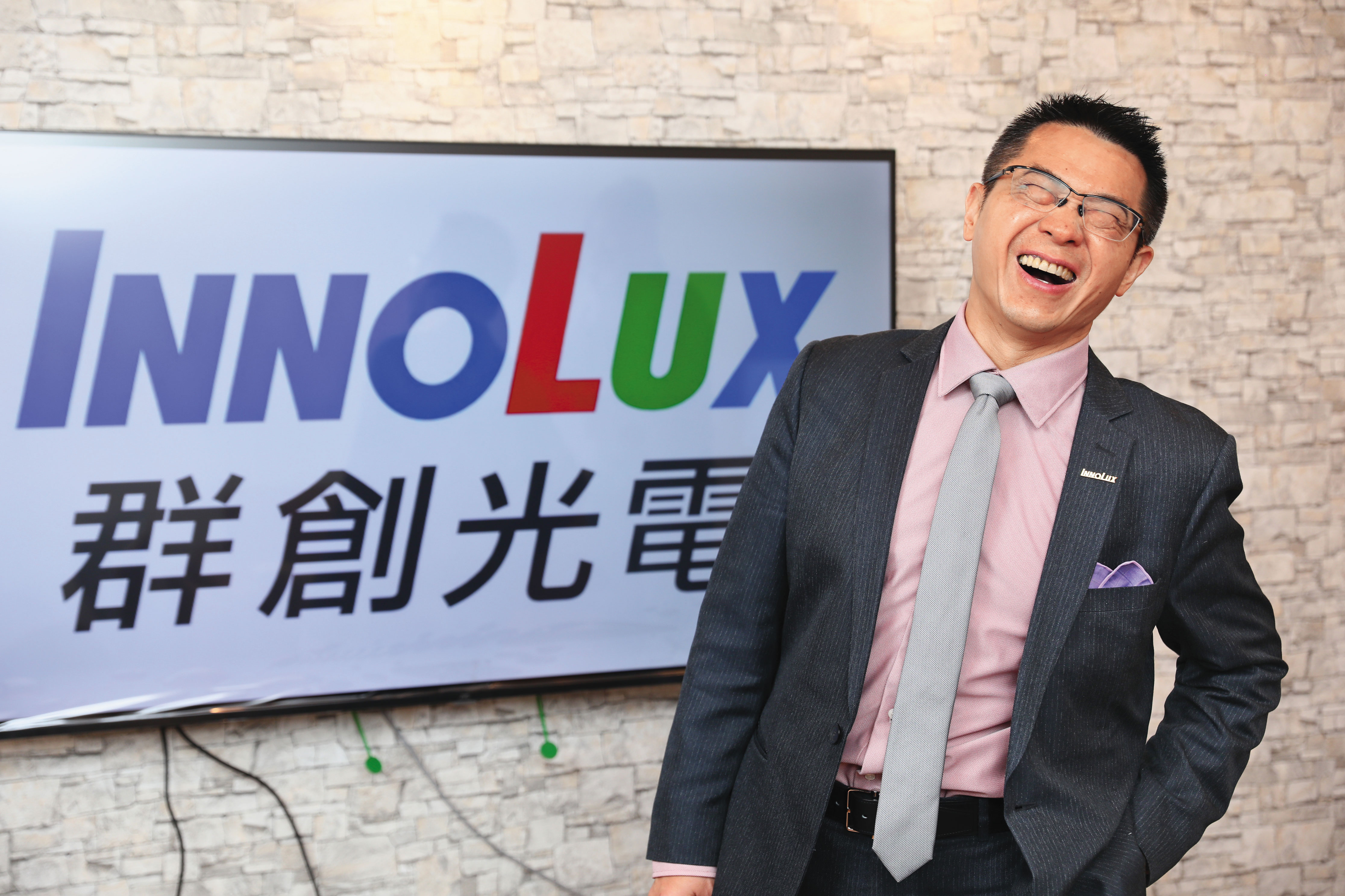 洪進揚2018年接任群創董事長後，聚焦車用顯示和FOPLP先進封裝技術。