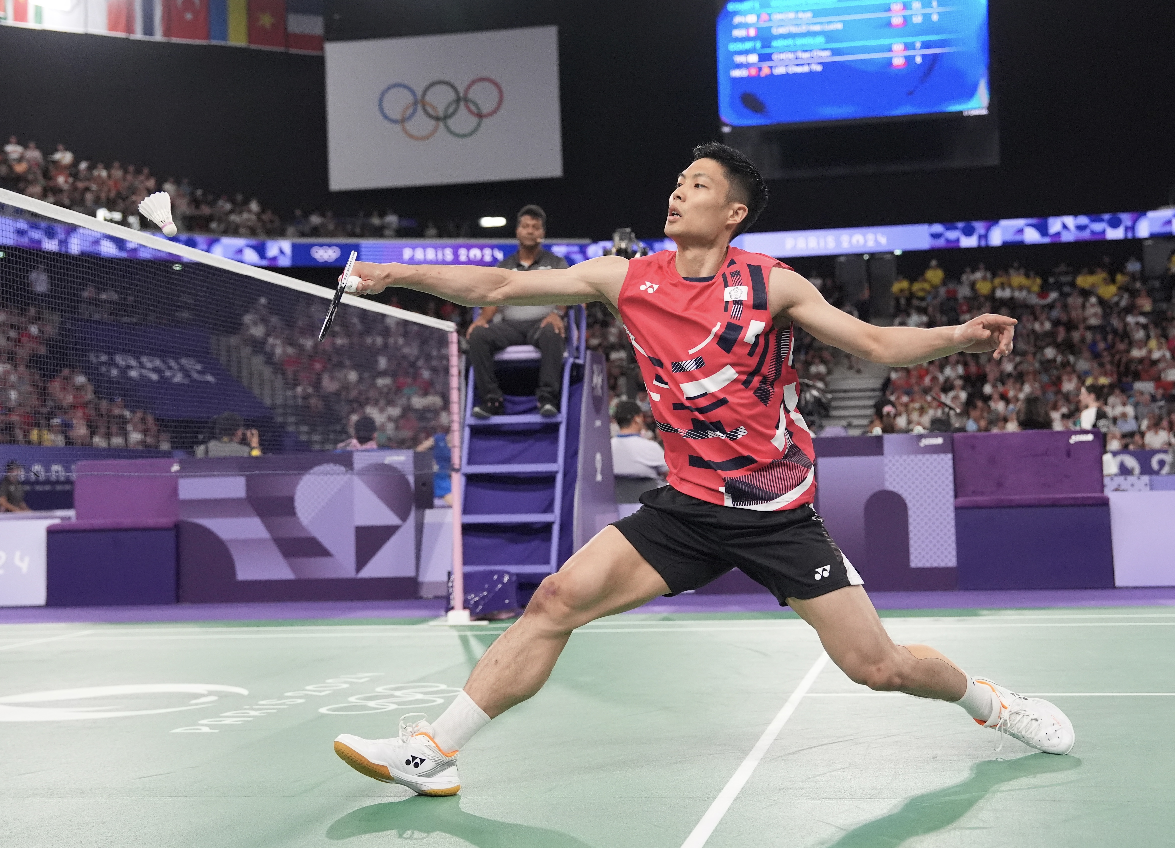 台灣羽球一哥周天成於8強賽過招印度好手。（中華奧會提供）