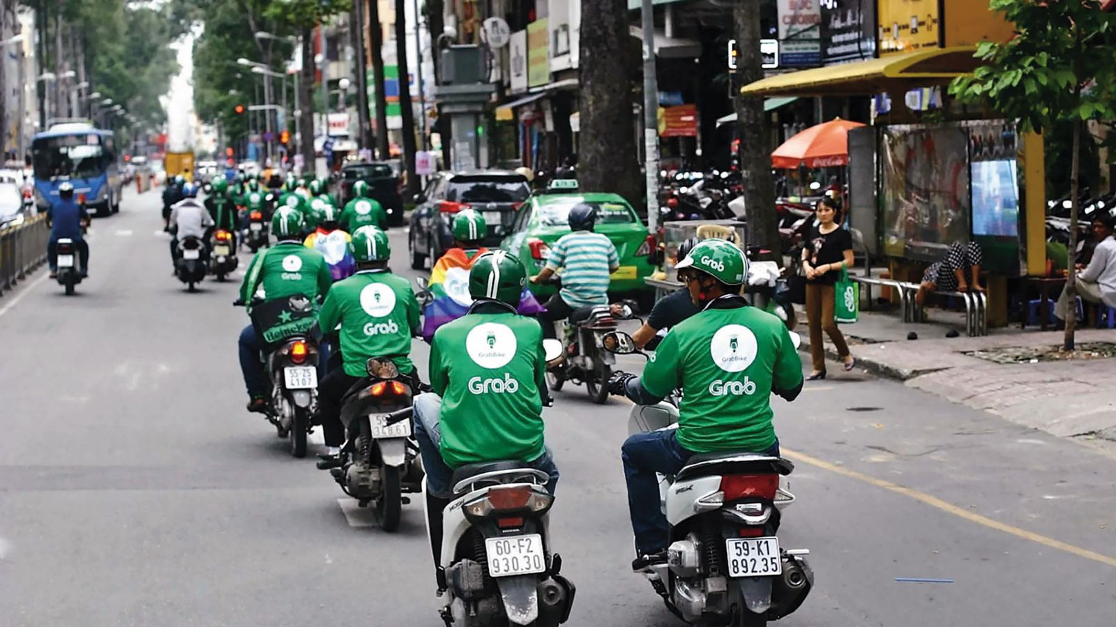 東南亞叫車暨外送巨頭Grab出價六億美元，欲買下foodpanda。（圖片來源：光陽機車）
