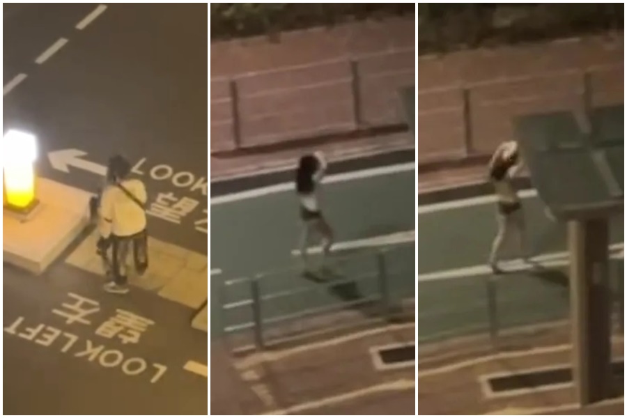 香港一對情侶日前深夜在街頭上發生爭執，然而女子一氣之下，竟當場在車道上脫到露奶半裸。（翻攝自臉書）