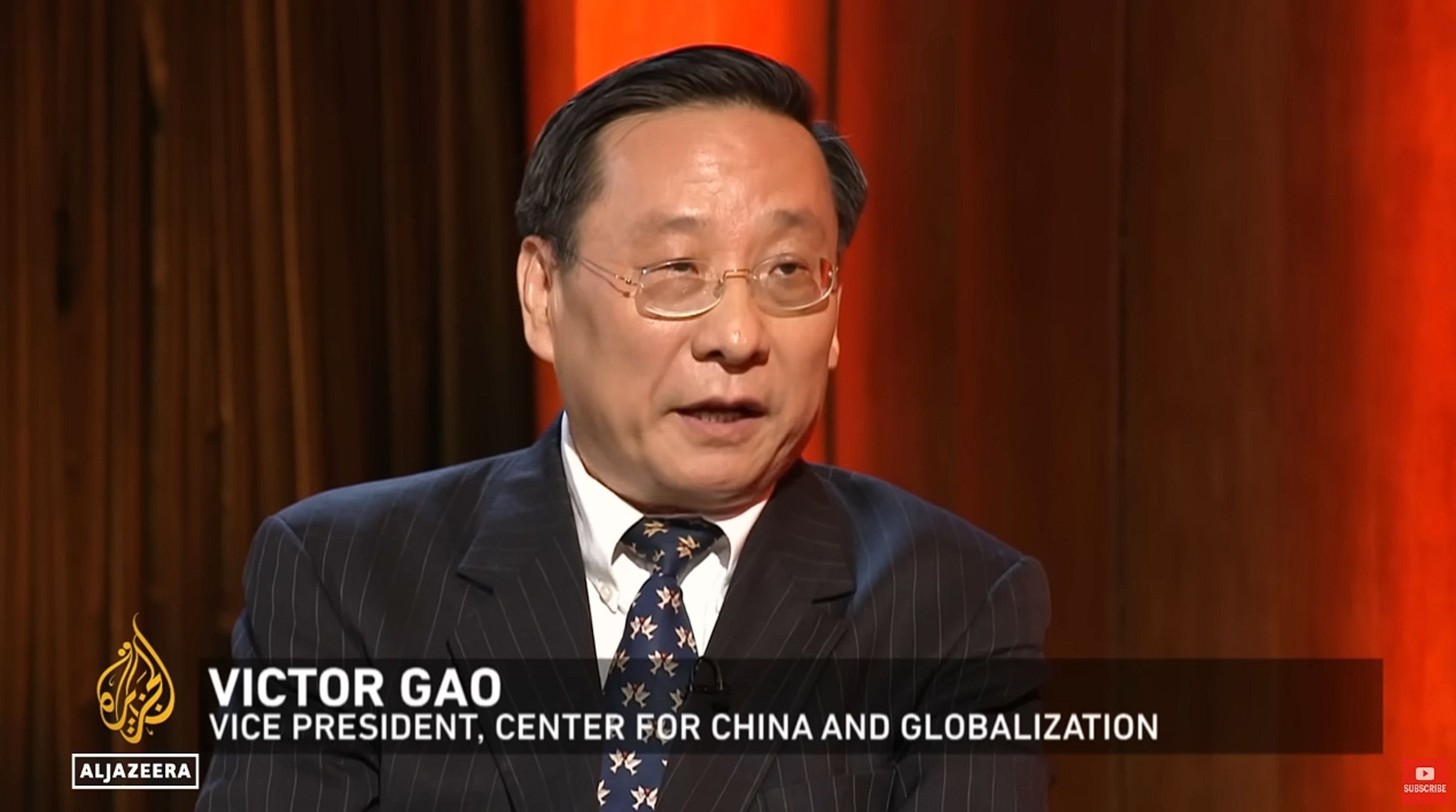 高志凱受訪一再重複中國大外宣的內容,卻擋不住主持人的犀利發問。(翻攝自半島電視台YouTube)