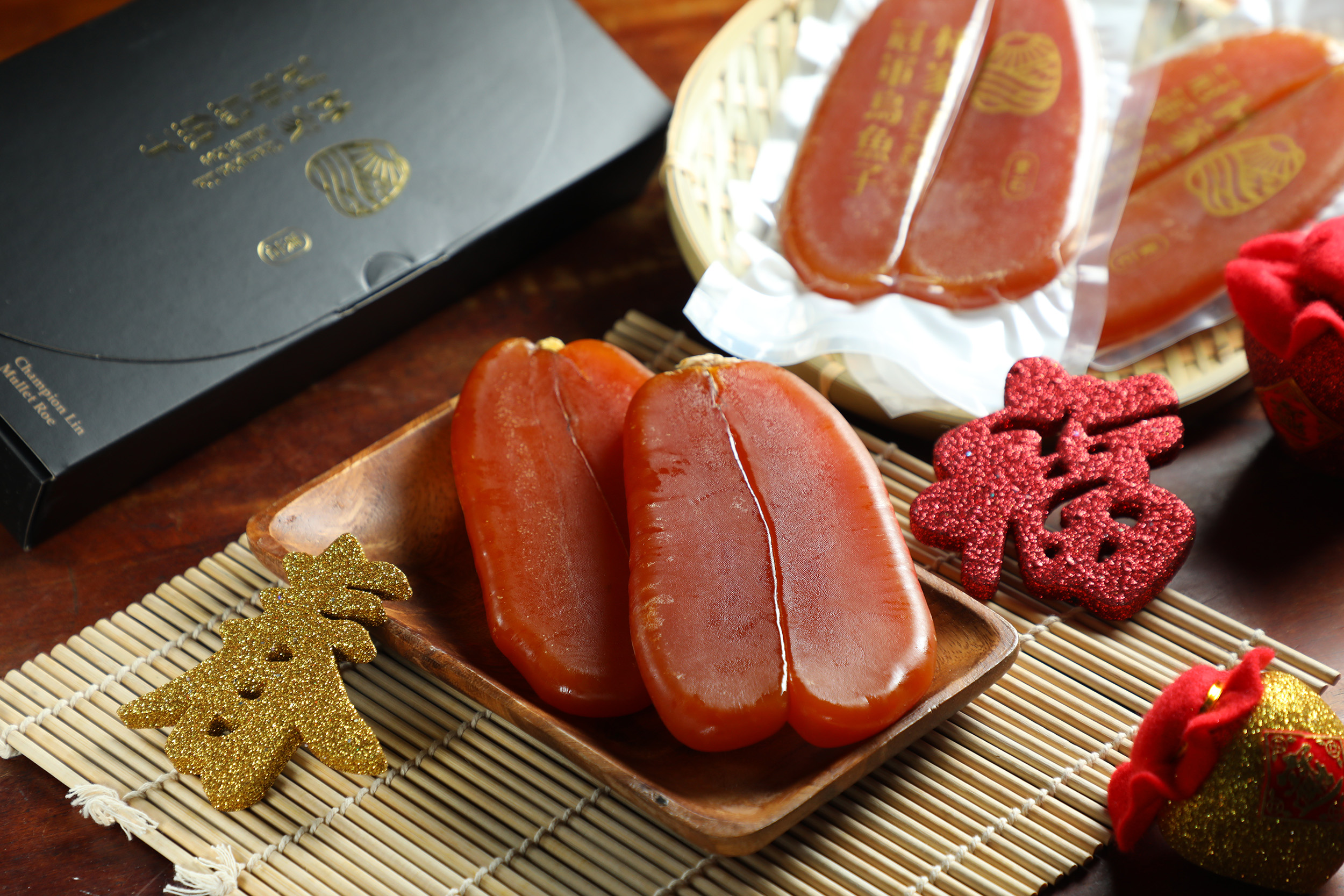 豐厚油脂香氣與軟Q綿密口感，是「林家冠軍烏魚子」的特色。（4兩烏魚子2,600元╱斤，圖中約650元╱片）