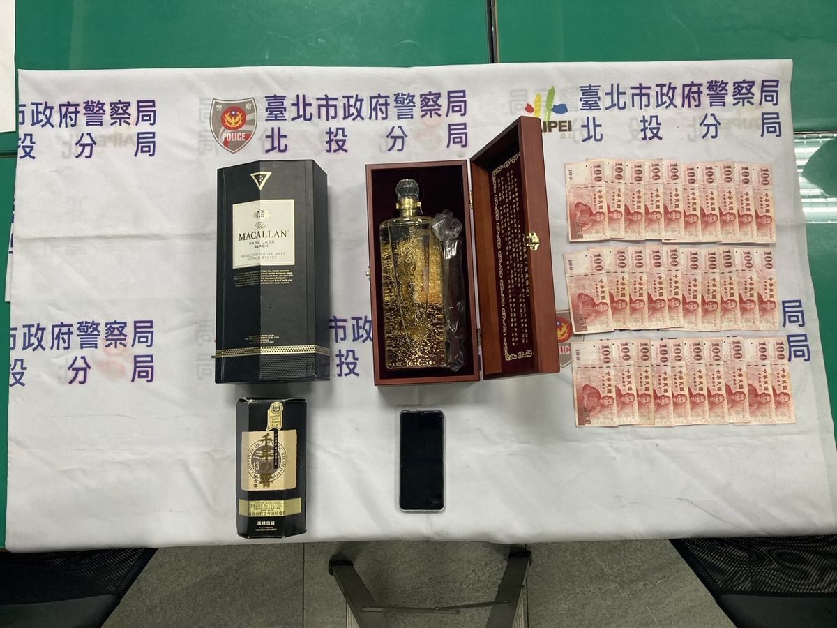 陳男趁颱風天潛入熱炒店偷走洋酒與現金。(翻攝畫面)