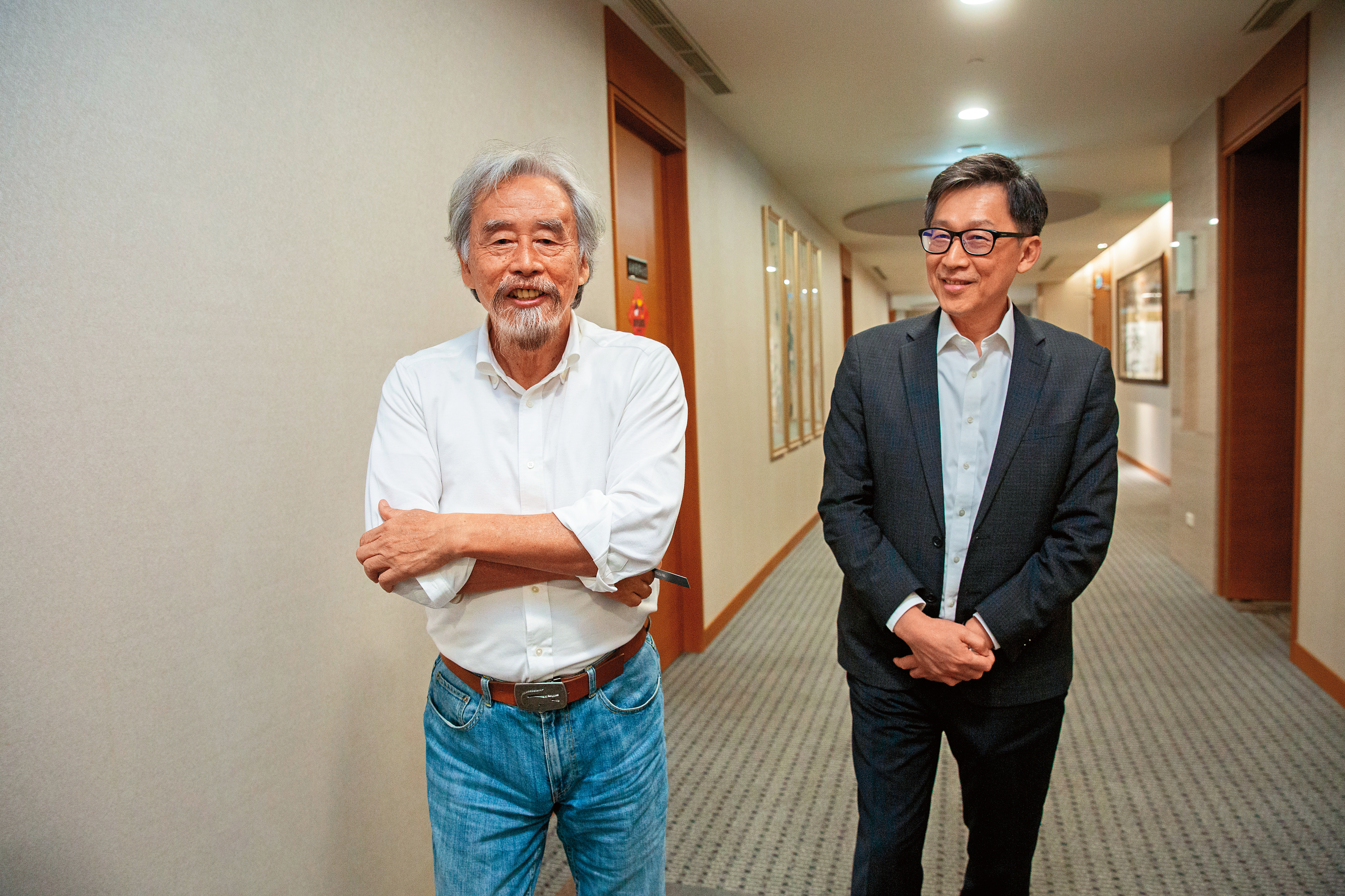 台灣光罩集團執行長吳國精（左），看中陳立惇（右）長達16年的台積電資歷，除了雄厚的人脈外，也希望陳把不斷追求突破的神山文化帶進台灣光罩。