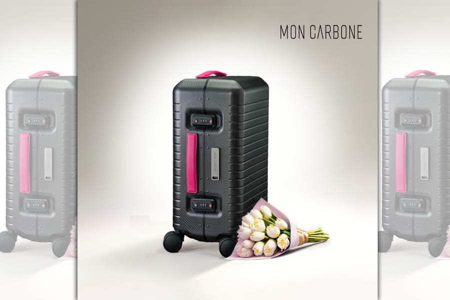 MON CARBONE經典之作BLACKDIAMOND碳纖維行李箱，今年特別推出母親節限定款，搭配專屬粉色皮革手把，呼應媽媽的堅韌溫柔。（業者提供）
