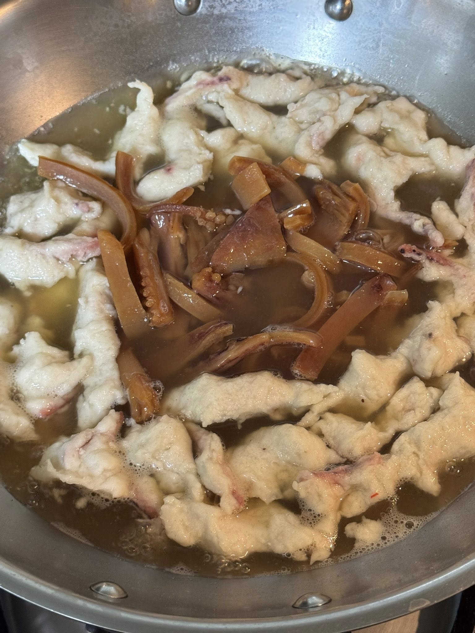 再下魷魚條。