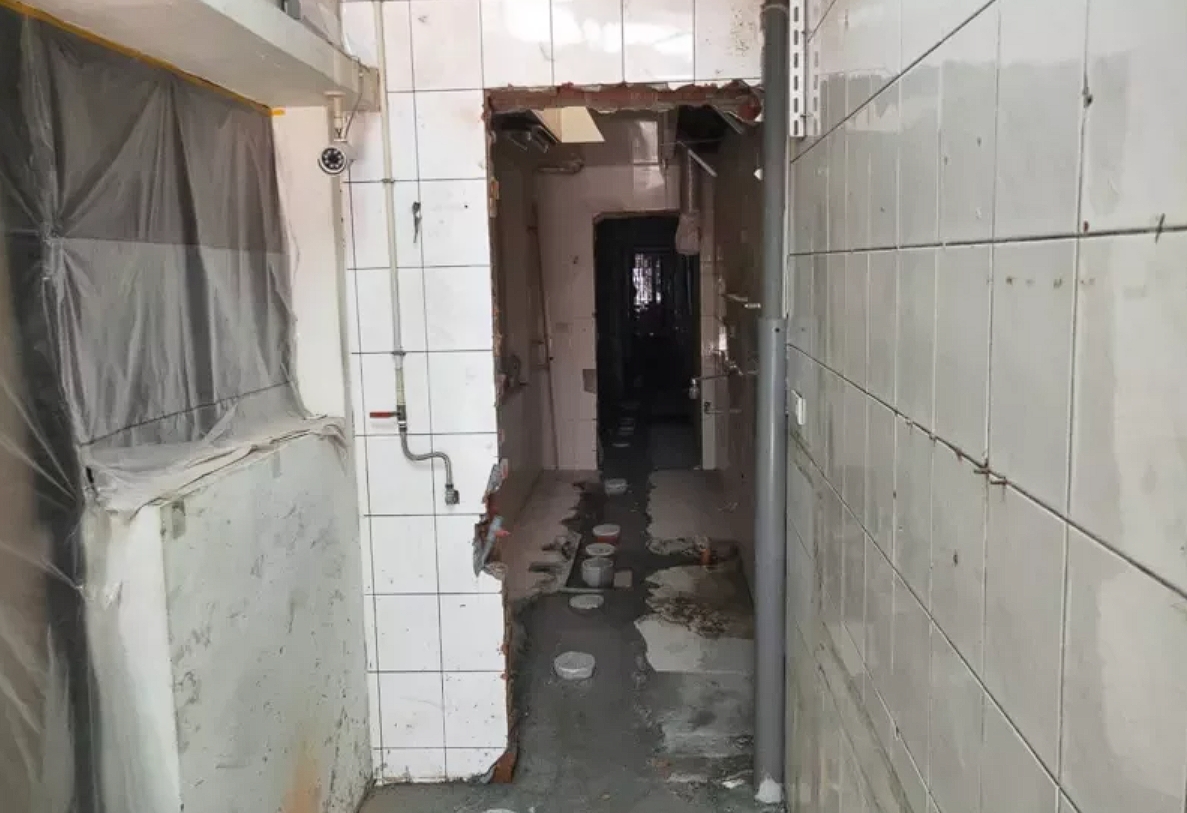 台中一名男子因家中違建需配合污水下水道工程拆除，不滿致電1999揚言對市長不利。（翻攝畫面）