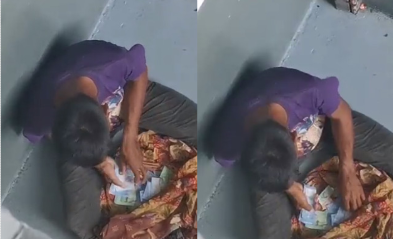 網路瘋傳一名乞丐行乞後，從布袋掏錢數錢數到手軟的畫面全被監視器錄下。（翻攝X@mynewshub）