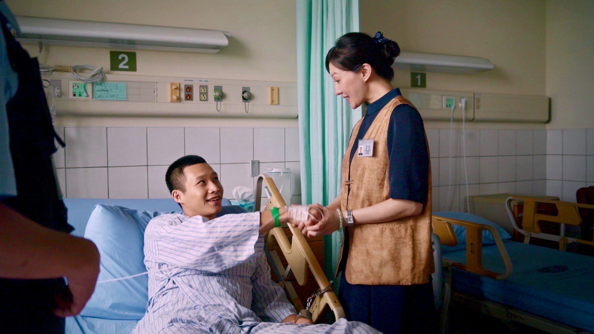 黃冠智飾演的更生人受到李杏感召。（大愛提供）