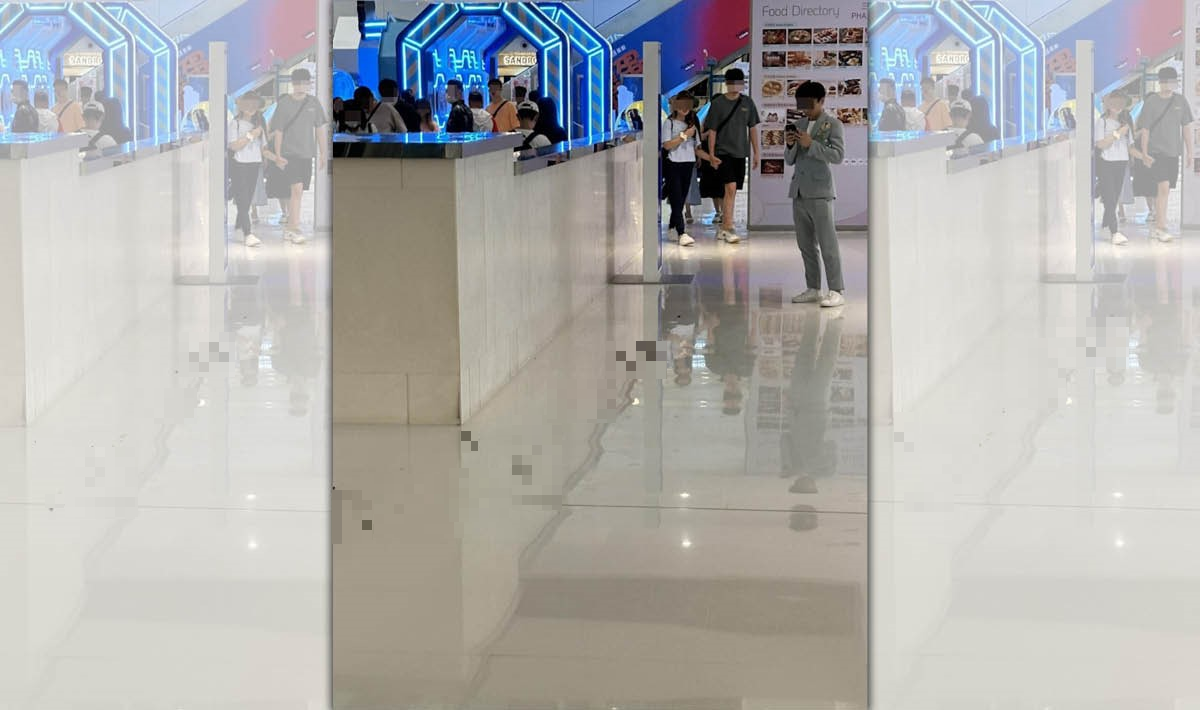 香港沙田新城市廣場,在人來人往的樓層地面,居然出現一條「會轉彎的大便路」。(翻攝自臉書Go Go Shatin)