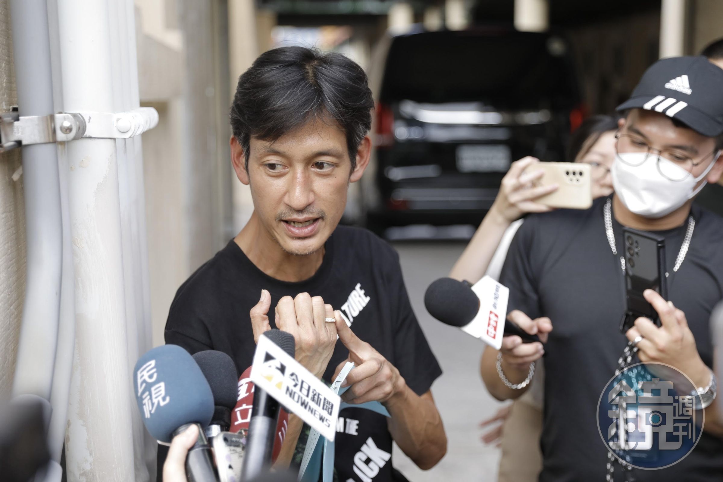 經過57天,唐治平終於到板橋殯儀館認屍簽字。